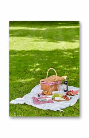 Wicker picnic hamper outdoors in a spring park
