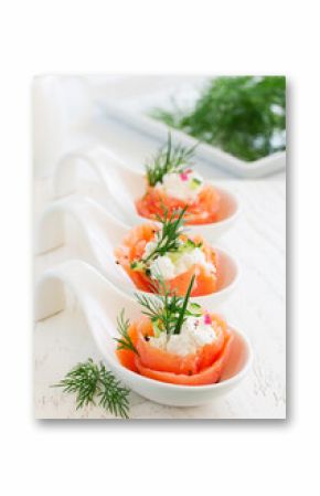 Appetizer of salted salmon and ricotta.
