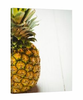 Fresh pineapple on wooden table