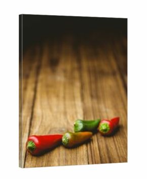 Hot peppers on wooden table