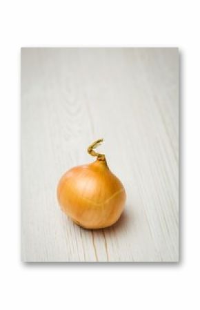 Fresh onion on wooden table