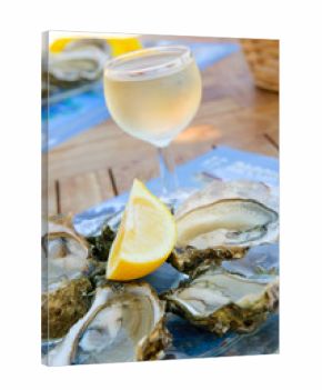 fresh oysters and a glass of wine