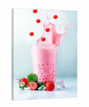 Splashing boba tea with falling pearls