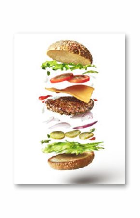 Delicious hamburger with flying ingredients