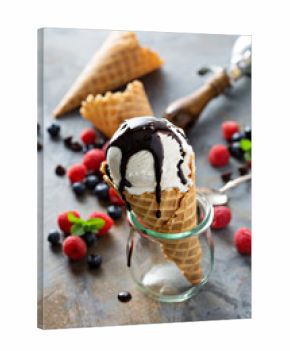Vanilla ice cream scoop in a waffle cone