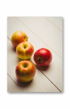 Fresh apples on wooden table
