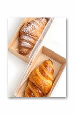 3d illustration of two croissants in boxes isolated on white background, one with sugar