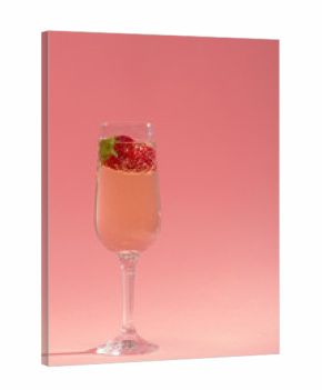 fresh strawberry on a glass with champagne