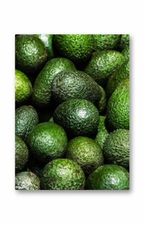 Avocado background. Fresh green avocado on a market stail. Food