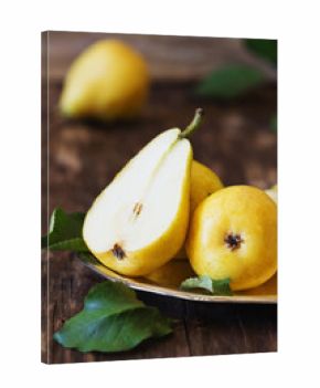 Organic ripe pear in vintage  plate