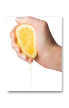 Hand squeezes lemon juice on a white background, isolated