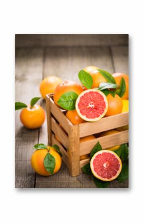 Fresh red grapefruit in the crate 