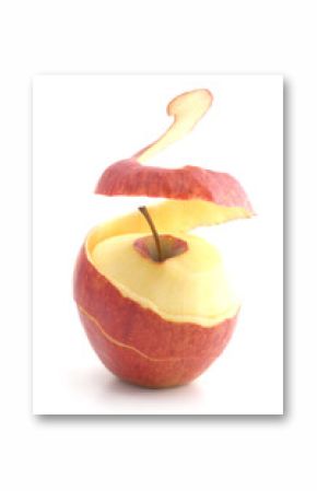 red peeled apple. peel levitates showing pulp