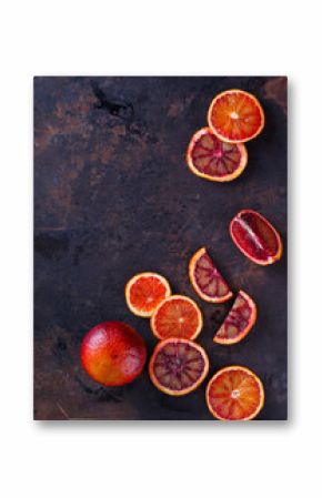 blood orange slices,on a black background.Copy space.selective focus.
