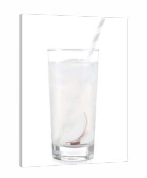 Glass of coconut water on white background