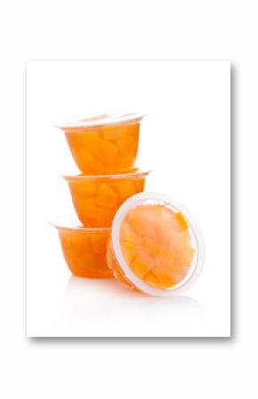 Single cups with peach in fruit jelly