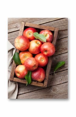 Red apples in wooden box