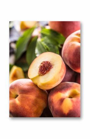 A group a ripe peaches on wooden table