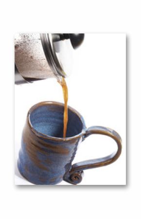 coffee poring in to a mug