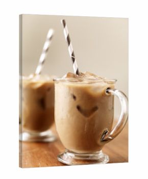 Iced coffee with black striped paper straw