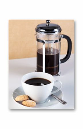 Cup of coffee with cafetiere and amaretti biscuits