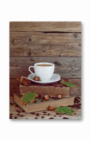 cup of coffee on the old books