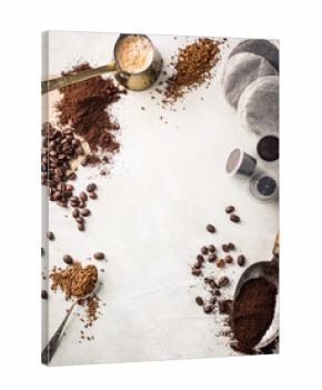 Background with assorted coffee, coffee beans, ground and instant, pads and capsules, retro style toned, copy space, top view.