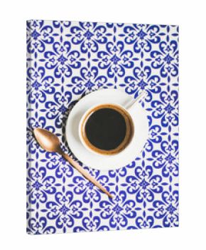 Cup of black Turkish or Eastern style coffee over oriental Moroccan patterned background, top view