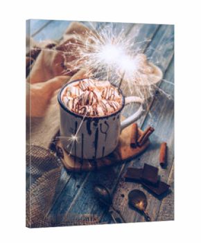 Hot chocolate with marshmallow candies and sparkles light