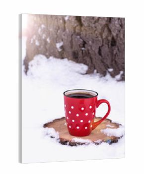 ceramic red cup with white polka dots with black coffee