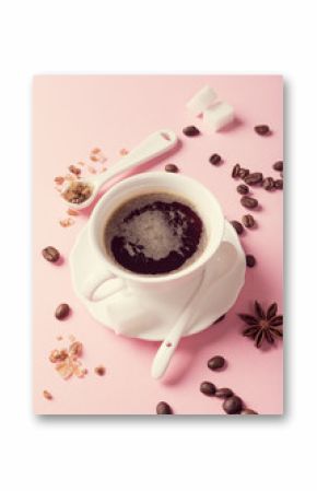 White cup of coffee with coffee beans, candy sugar and spices on pink background. Retro style toned.