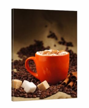 orange cup with hot cuppuccino