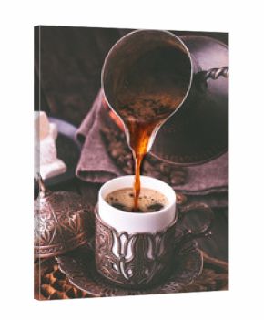 Pouring turkish coffee