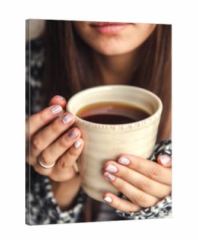 a cup of coffee in a beautiful female hands and beautiful lips