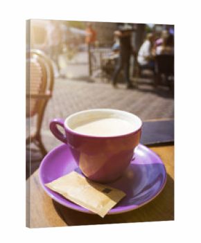 purple cup of coffee outdoors