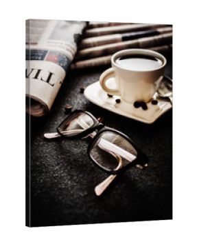 Glasses and newspaper