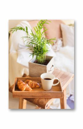Morning cup coffee or tea with croissant apartment interiour