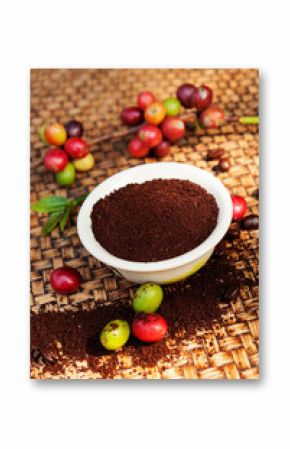 Red, green coffee berries and coffee powder.