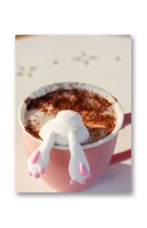 Cute bunny marshmallow in cup of coffee or cocoa. Funny food concept
