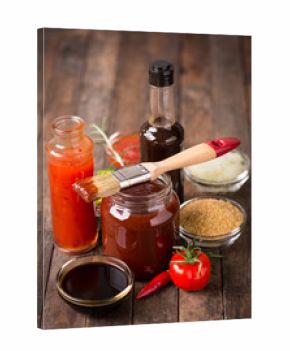 Barbeque sauce with ingredients on the table