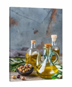 Assortment of fresh organic extra virgin olive oil in bottles