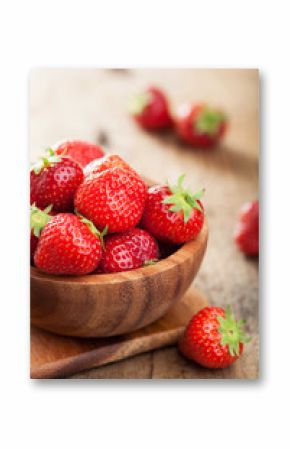 fresh strawberry in wooden bowl