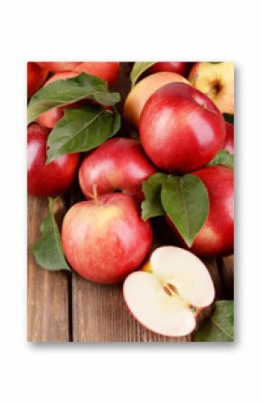 Ripe red apples on wooden background
