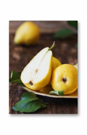 Organic ripe pear in vintage  plate