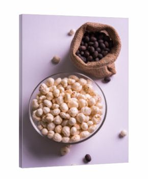 makana or makhana or roasted lotus seed served in a bowl, selective focus