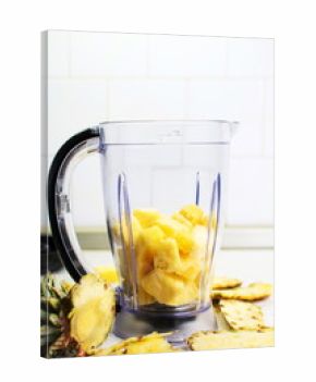 Pineapple slices in a blender