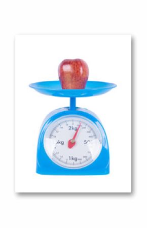 apple on kitchen scale isolated on white background