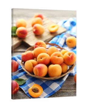 Ripe apricots fruit on grey wooden table