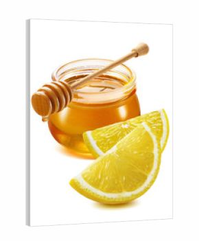 Honey jar and lemon pieces isolated on white background