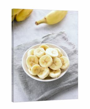 Sliced ripe banana in bowl